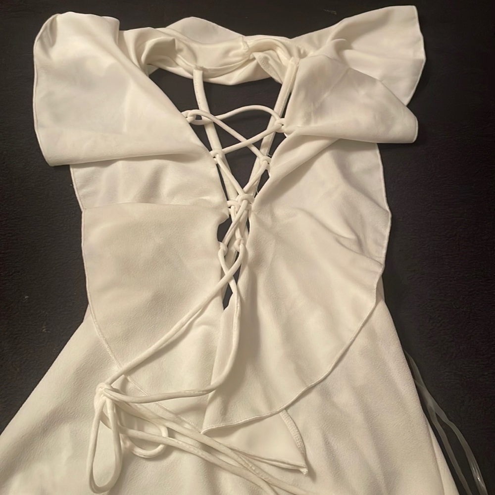 Cheeky Ivory Deep V lace up ruffle top size Large
